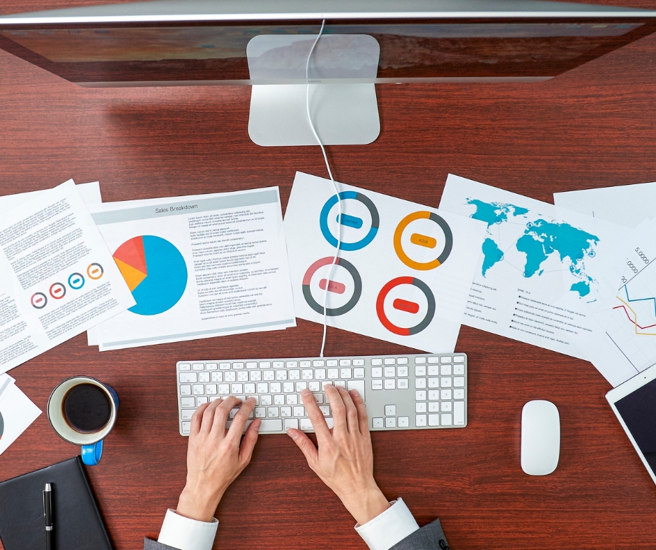 a picture showing a person looking at different kinds of marketing analytics